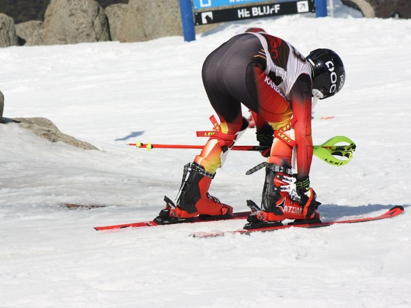 skiing in snowy mountains
